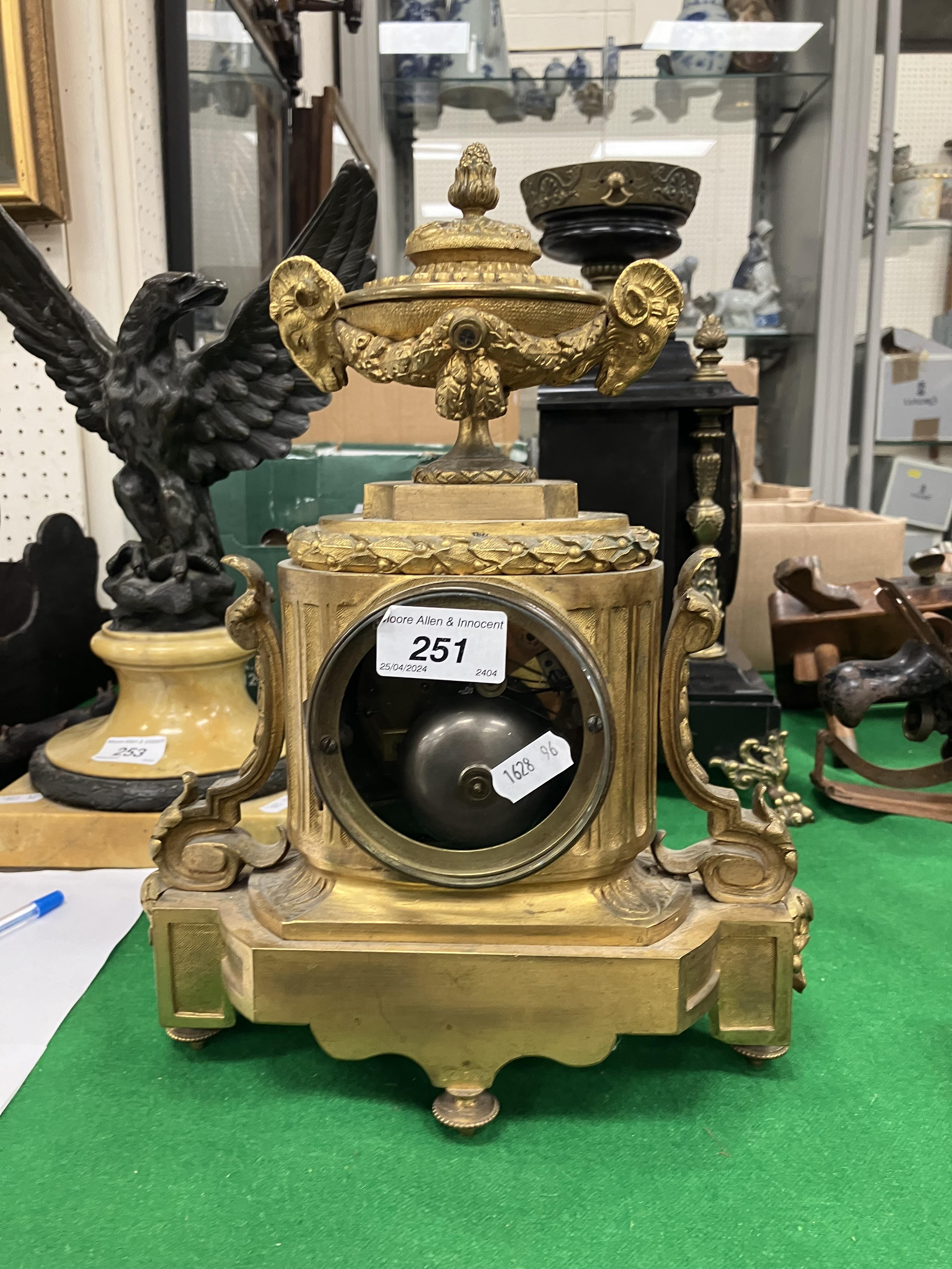 A 19th Century French gilt brass cased mantel clock, - Image 17 of 34