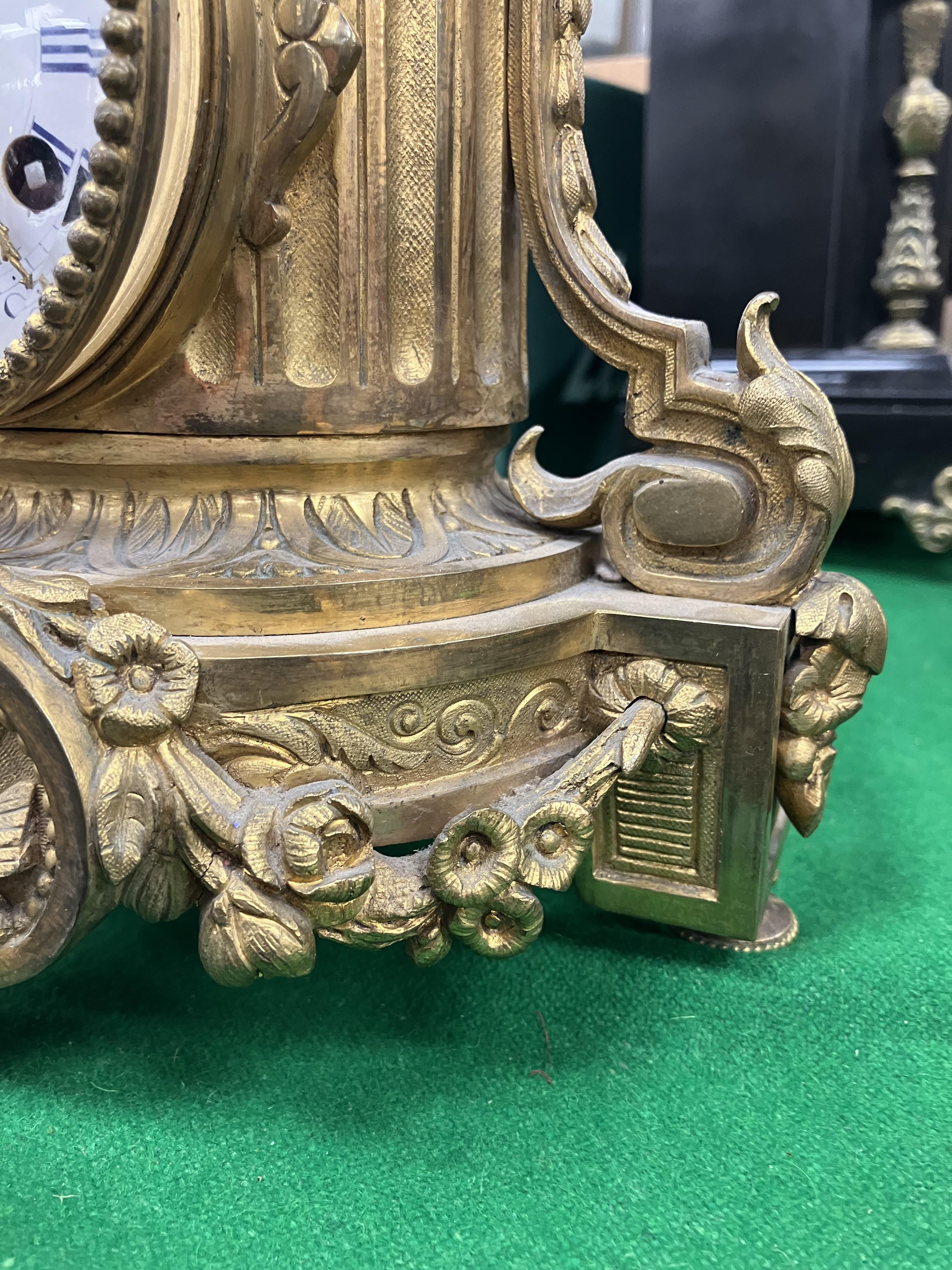 A 19th Century French gilt brass cased mantel clock, - Image 22 of 34