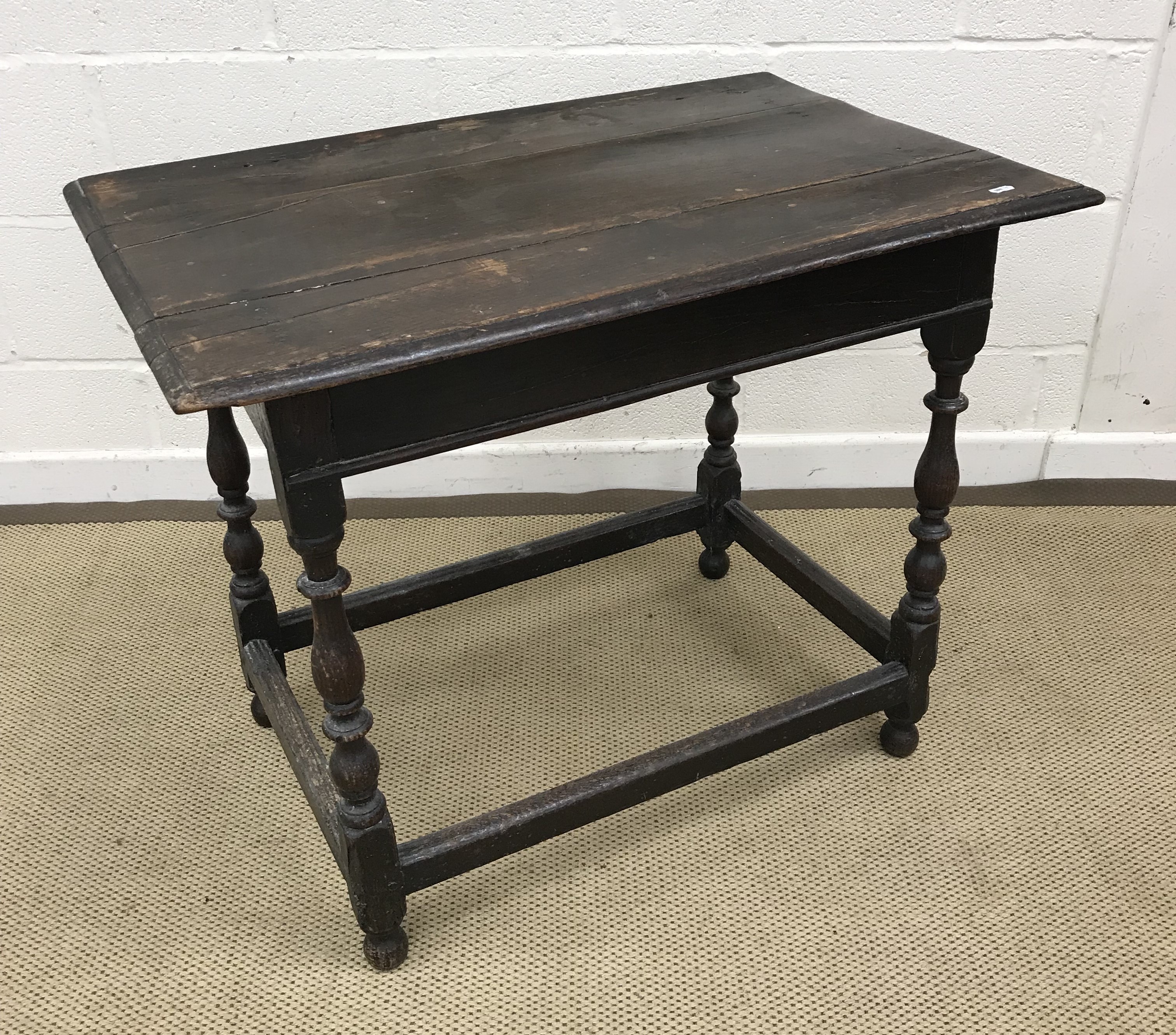 An 18th Century oak side table,