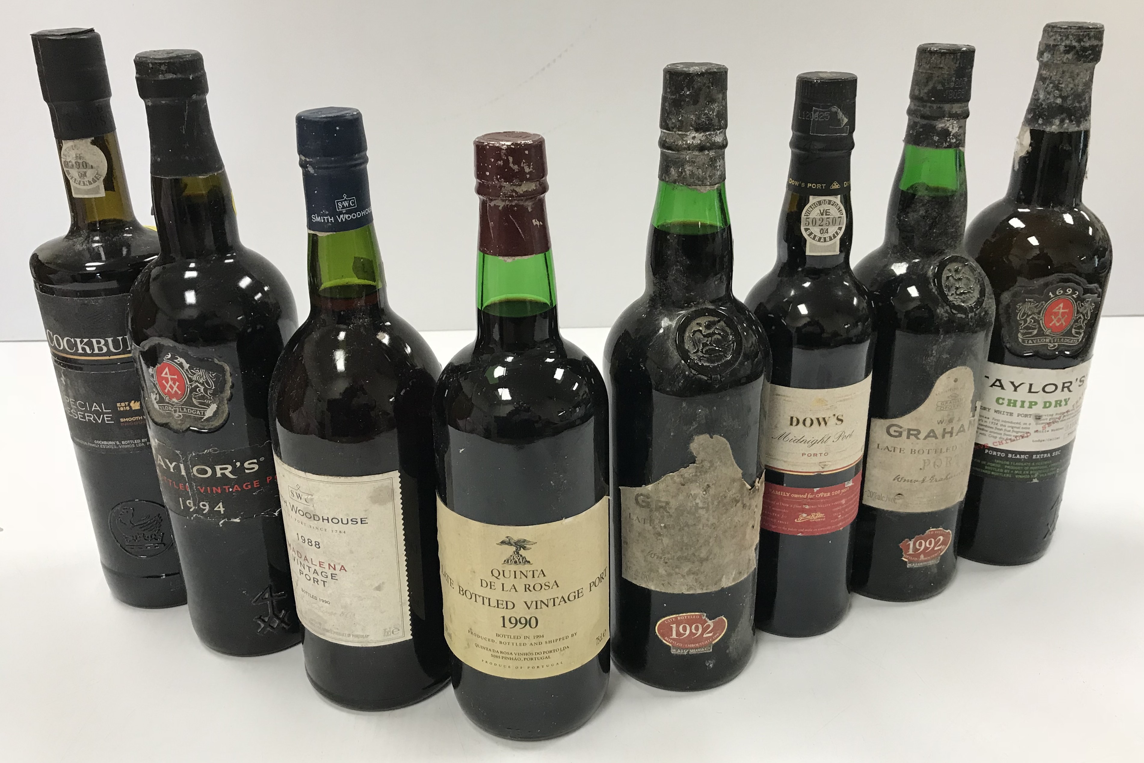 A collection of eight bottles of vintage port including two W. & J.