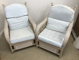 A pair of MGM cane work and bentwood conservatory armchairs with upholstered back panels and seats,