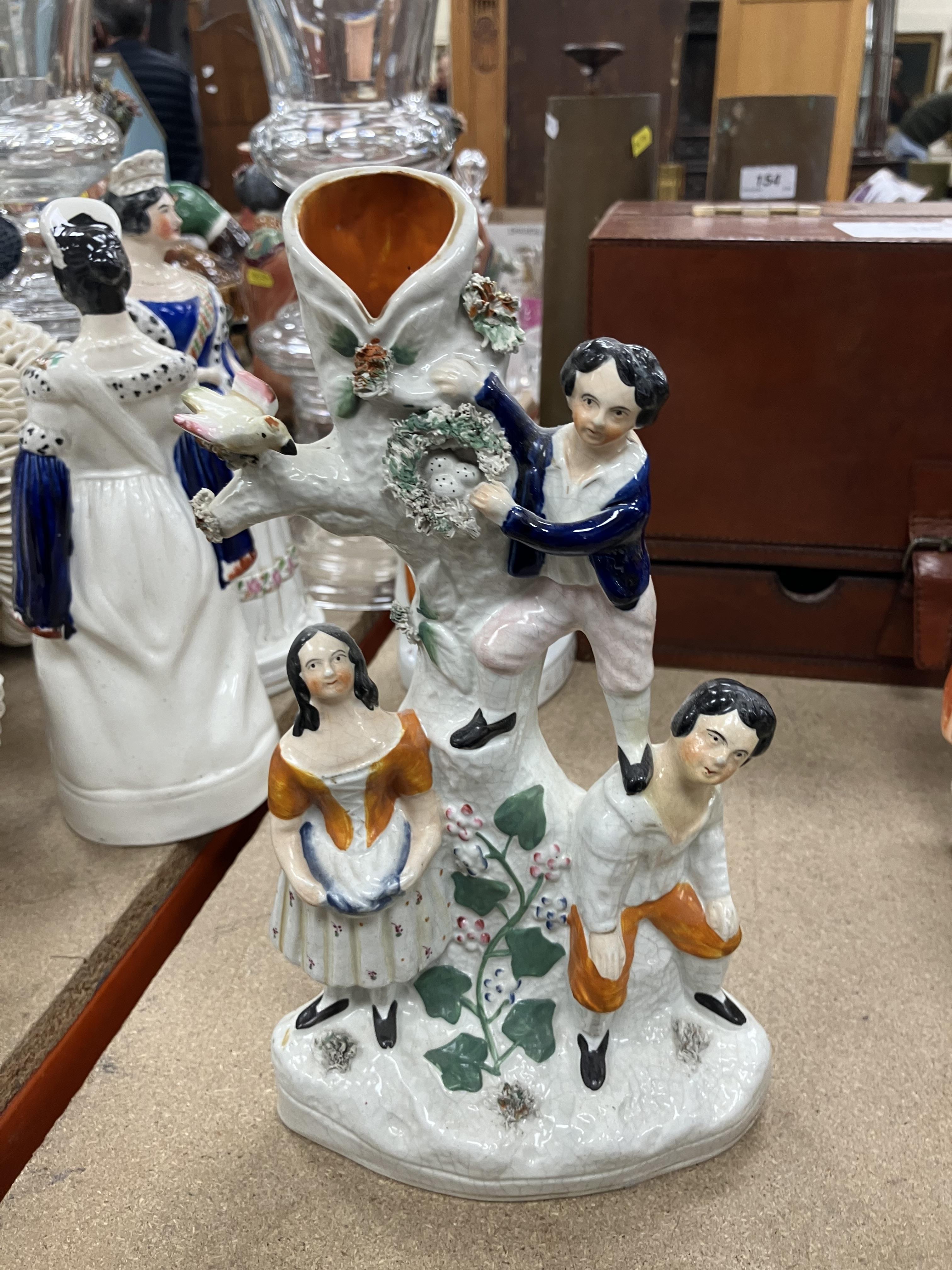 A collection of ten 19th Century Staffordshire figures including Victoria and Albert standing 27. - Image 27 of 133