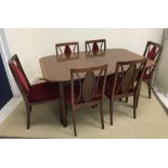 A set of six G Plan Fresco dining chairs with upholstered backs together with a mahogany and cross