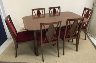 A set of six G Plan Fresco dining chairs with upholstered backs together with a mahogany and cross