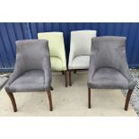 A collection of four similar upholstered reception chairs on sabre legs