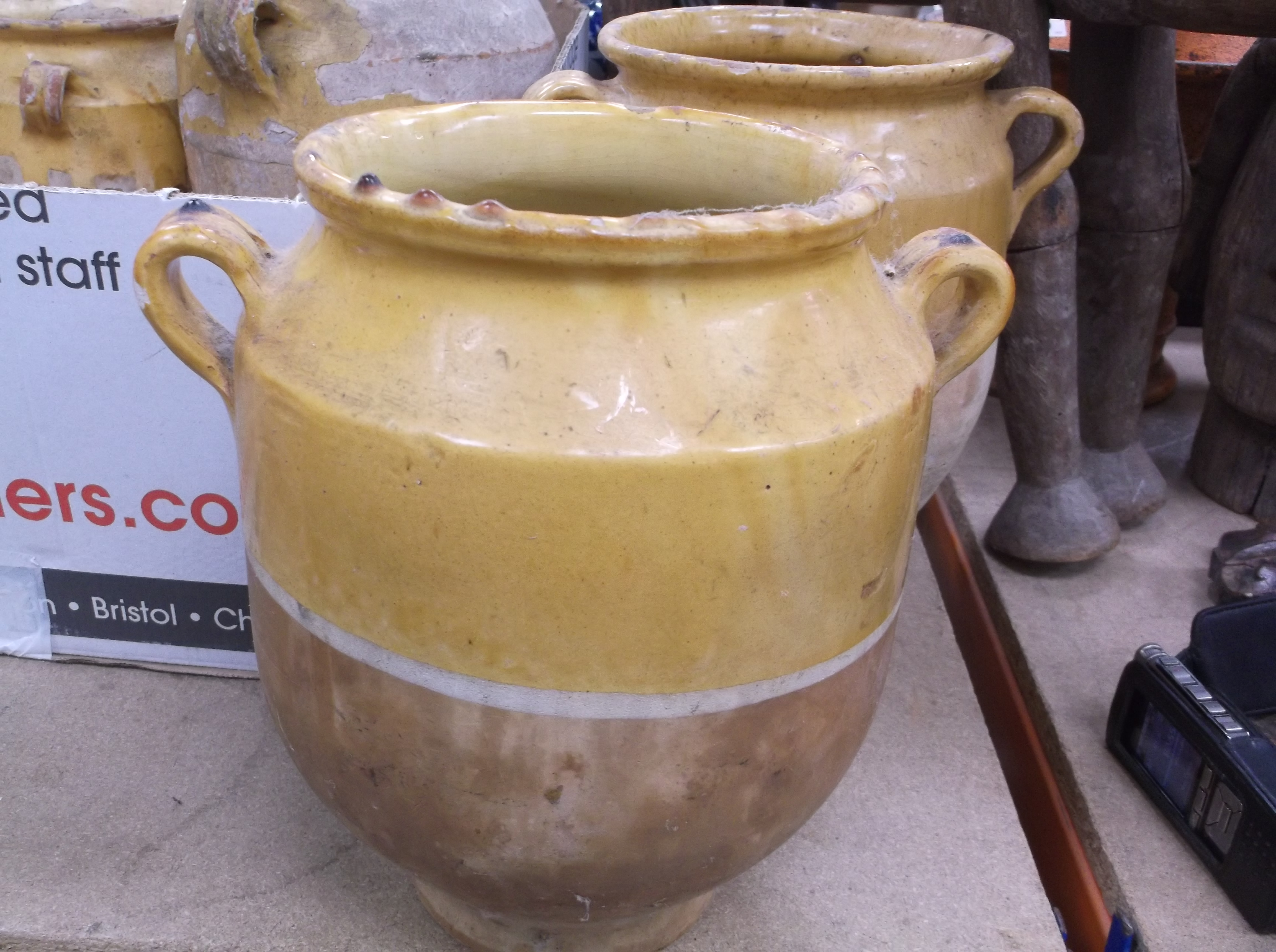 A collection of four 19th Century and later French ochre part glazed confit pots with lug handles, - Image 11 of 21