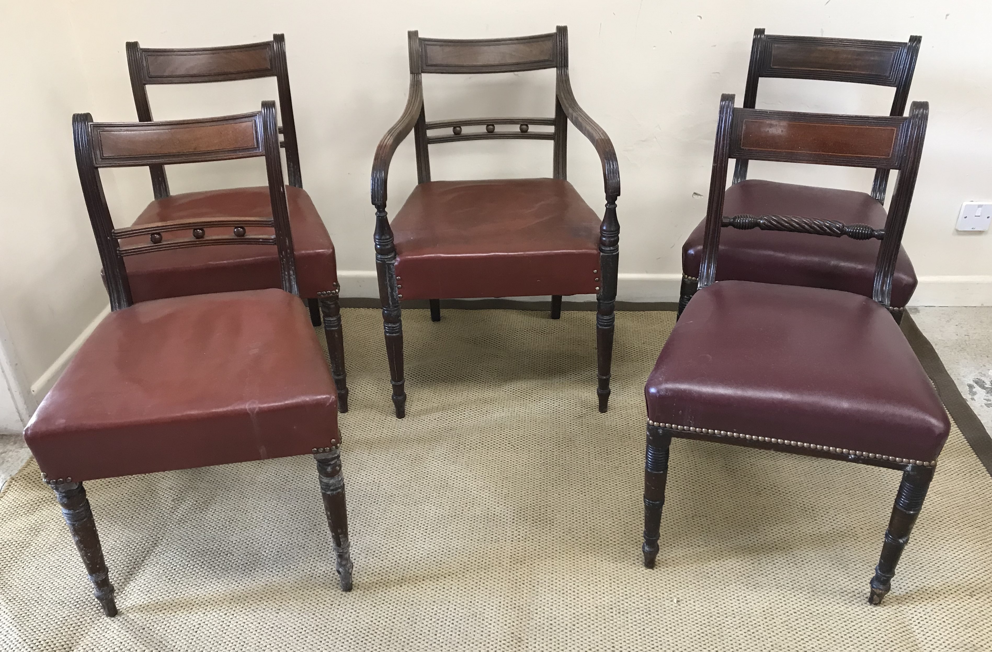 A set of five Victorian mahogany bar back dining chairs with drop in seats on turned legs united by - Image 2 of 2