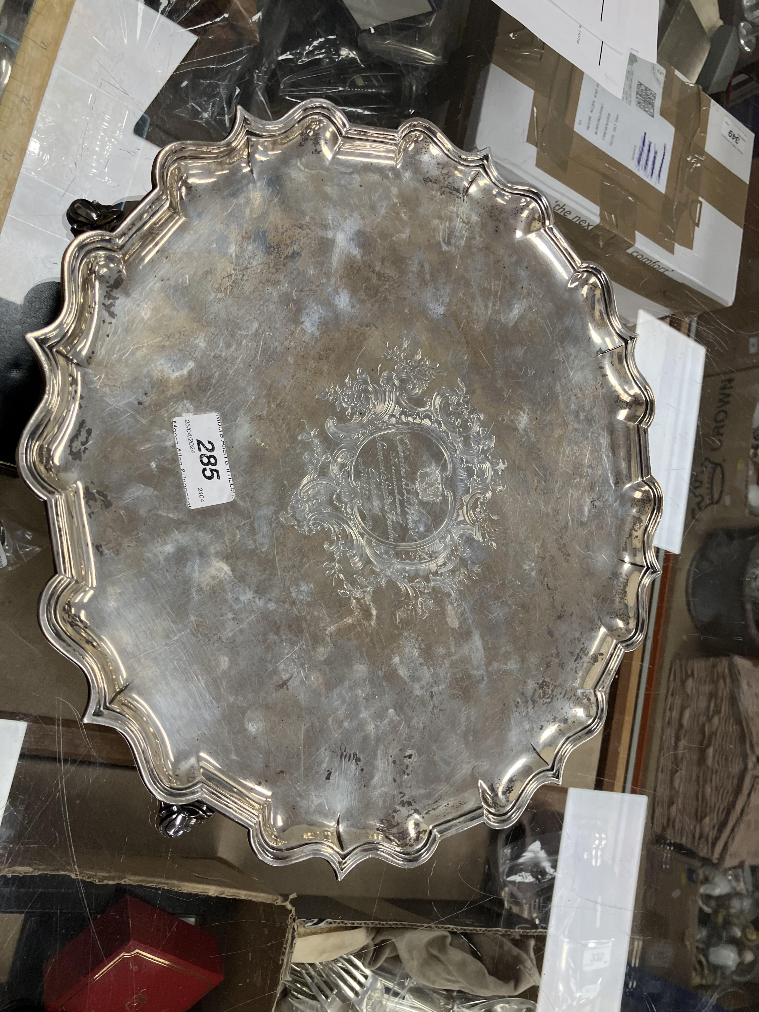 A George II silver salver with pie crust edge raised on four scrolling feet bearing inscription - Image 4 of 8