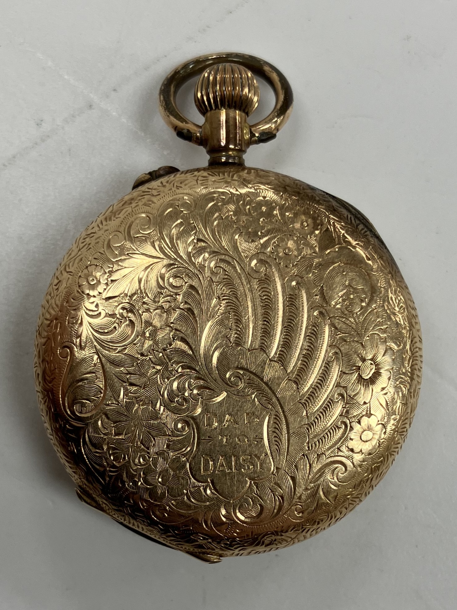 A late Victorian 14 carat gold ladies fob watch with gilt decorated porcelain dial and Roman - Image 2 of 2