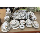 A large collection of Royal Worcester "Evesham" pattern dinner wares comprising six dinner plates,