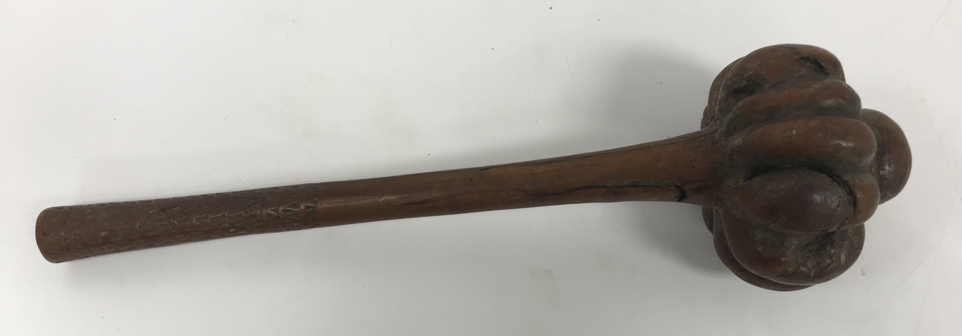 A Fiji throwing club Iula Mudu Melanesia with lobed head and domed finial,