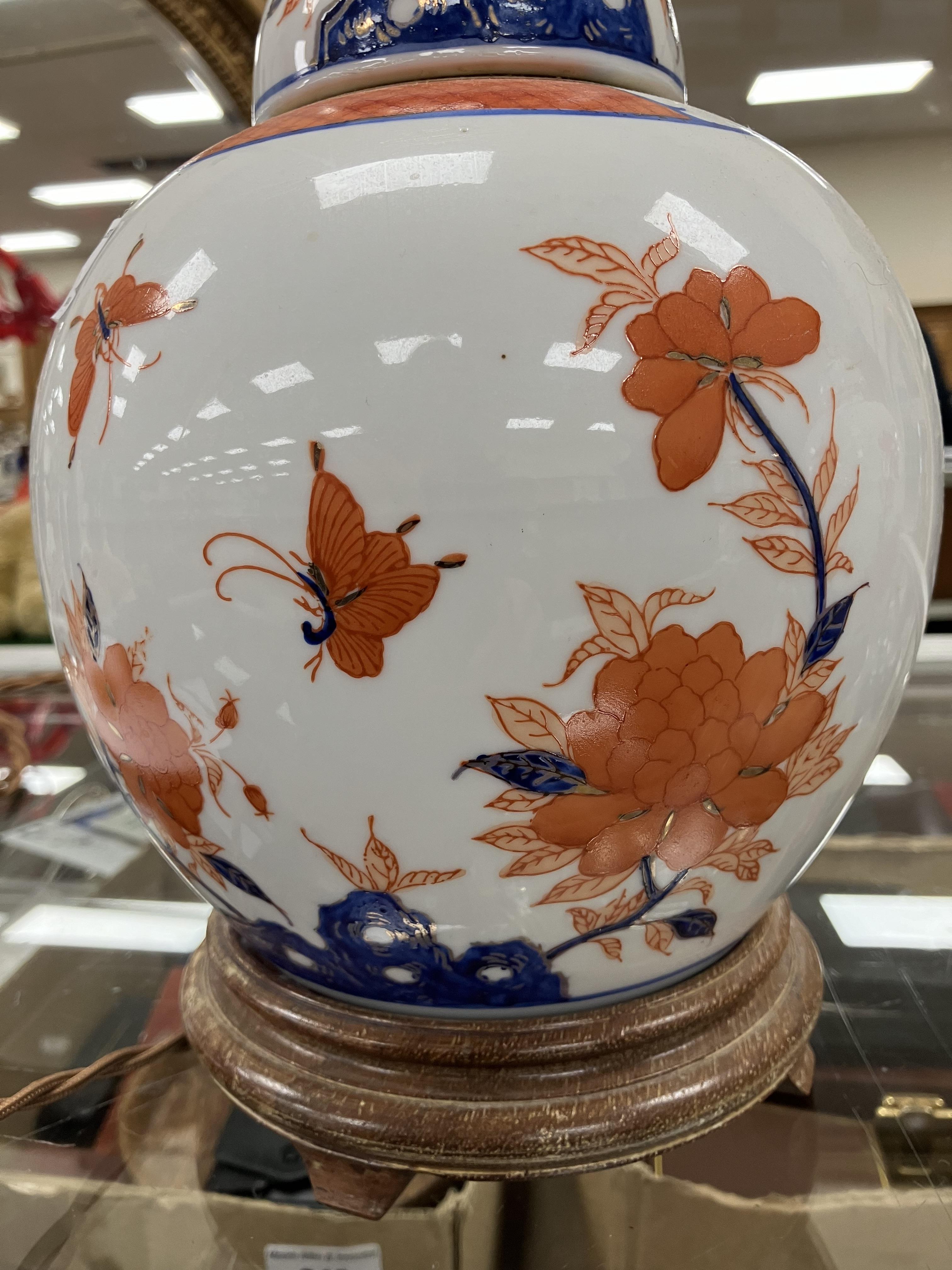 A pair of Japanese porcelain butterfly and flower decorated table lamps of ginger jar form in the - Image 7 of 32