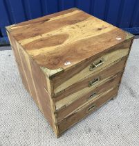 A modern military style teak brass bound chest of four long drawers,