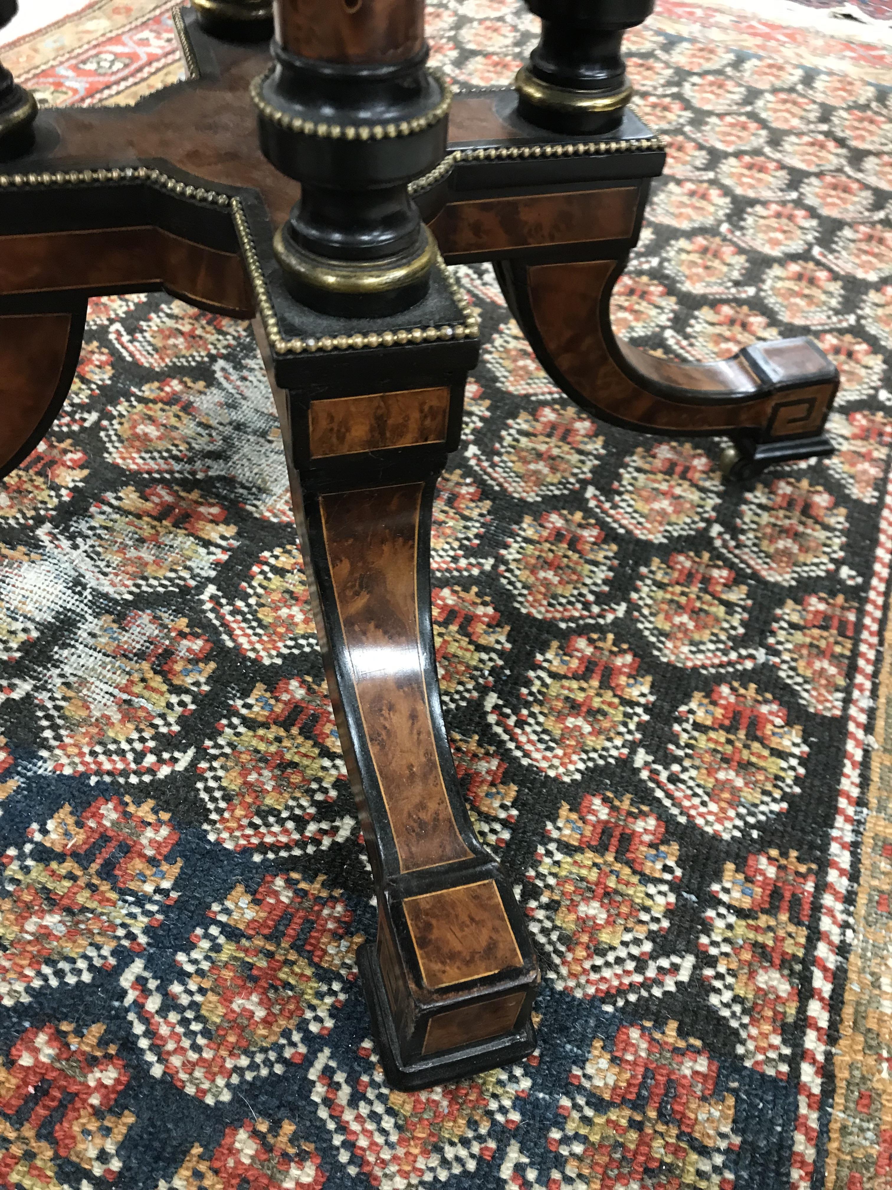 A Victorian amboyna and ebonised centre table, - Image 12 of 34