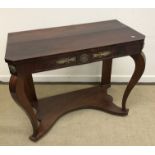 A mahogany console table in the 19th Century French Empire taste,