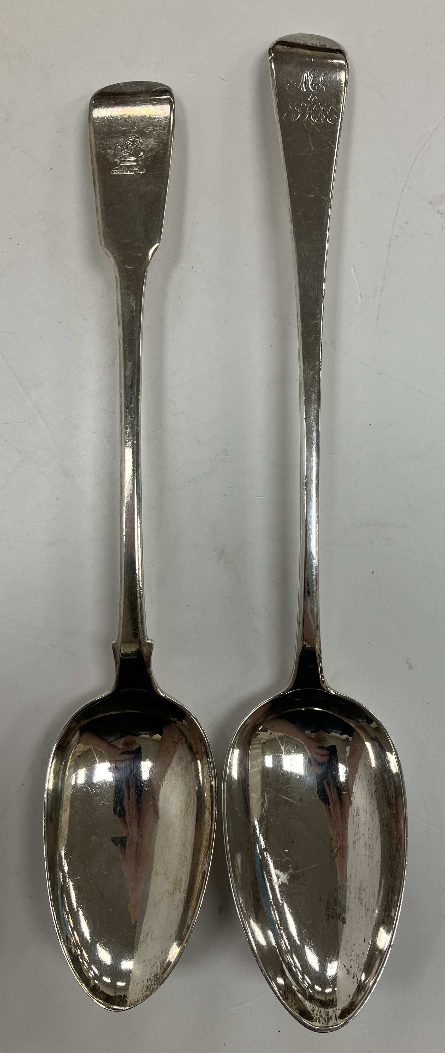 A George IV silver "Fiddle" pattern serving spoon (by Charles Eley, London 1825) 29.9 cm long, 3.