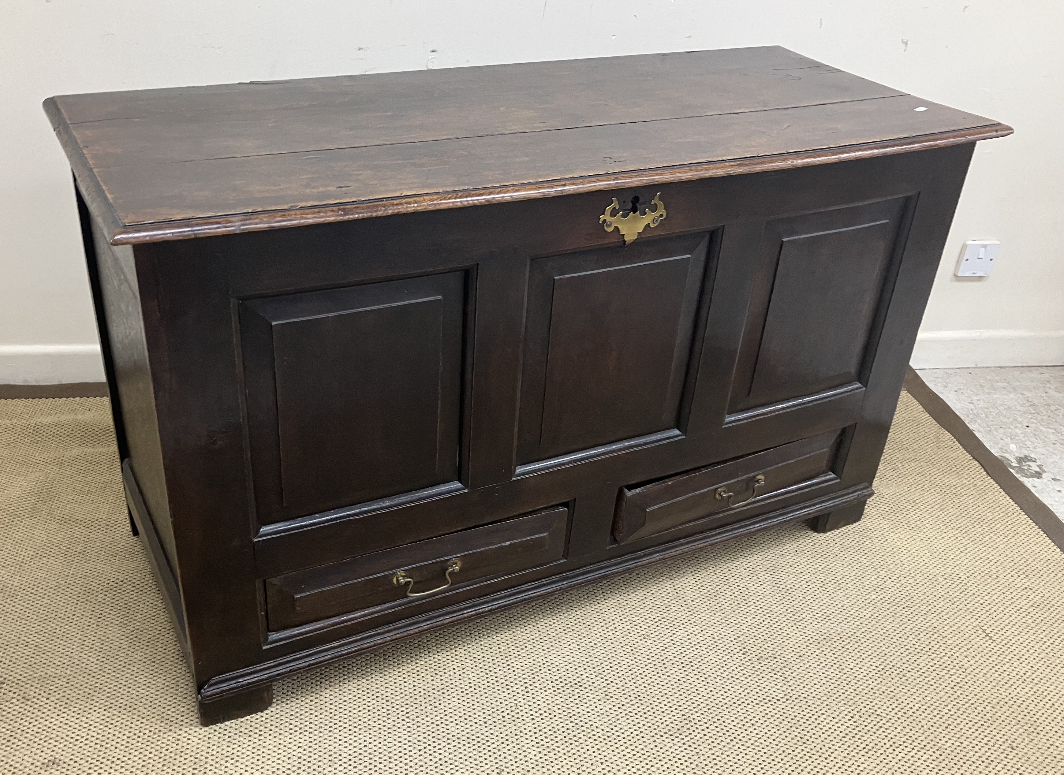 An 18th Century oak mule chest,