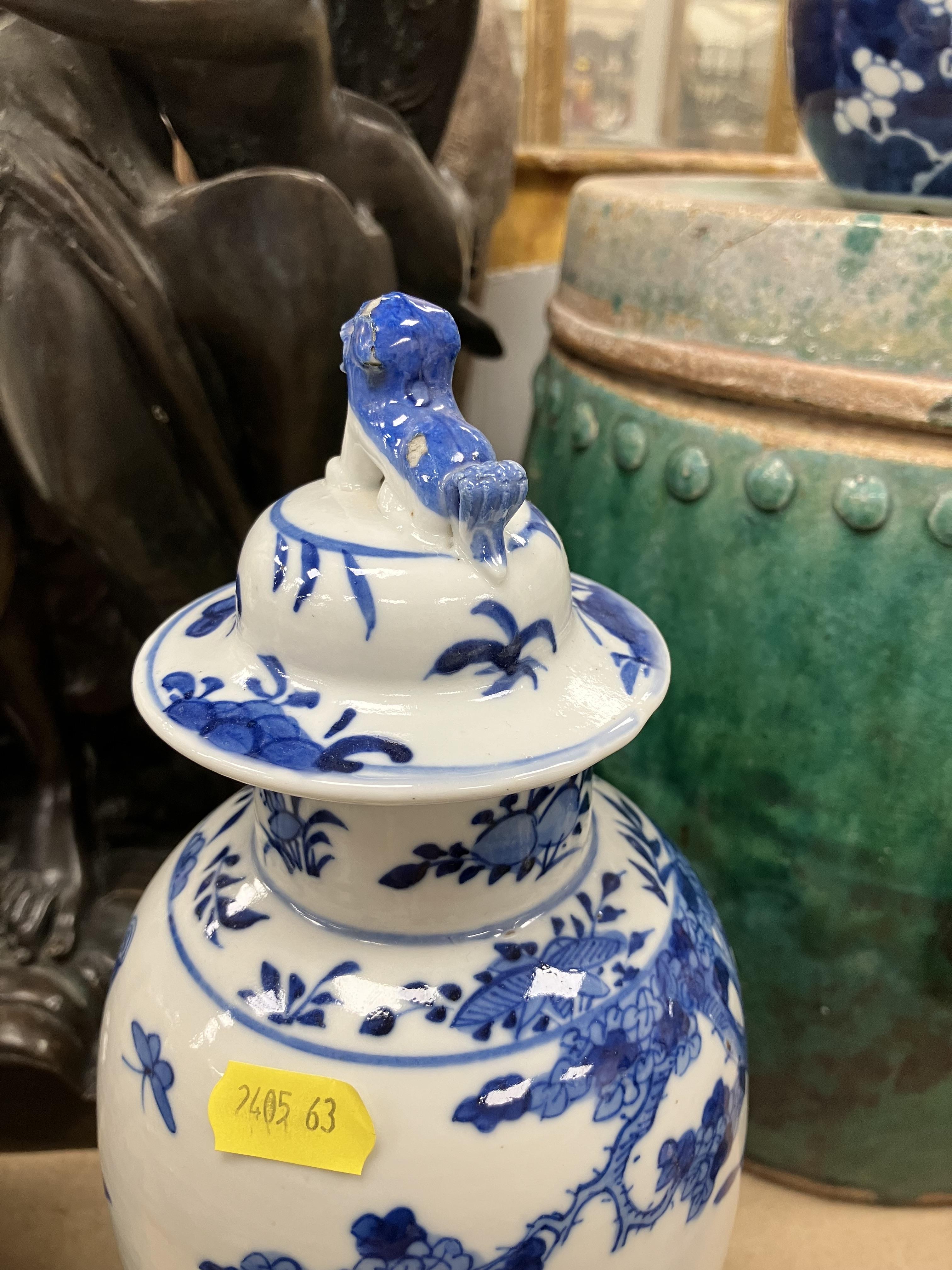 A pair of 19th Century Chinese blue and white baluster shaped vases and covers, - Image 19 of 54