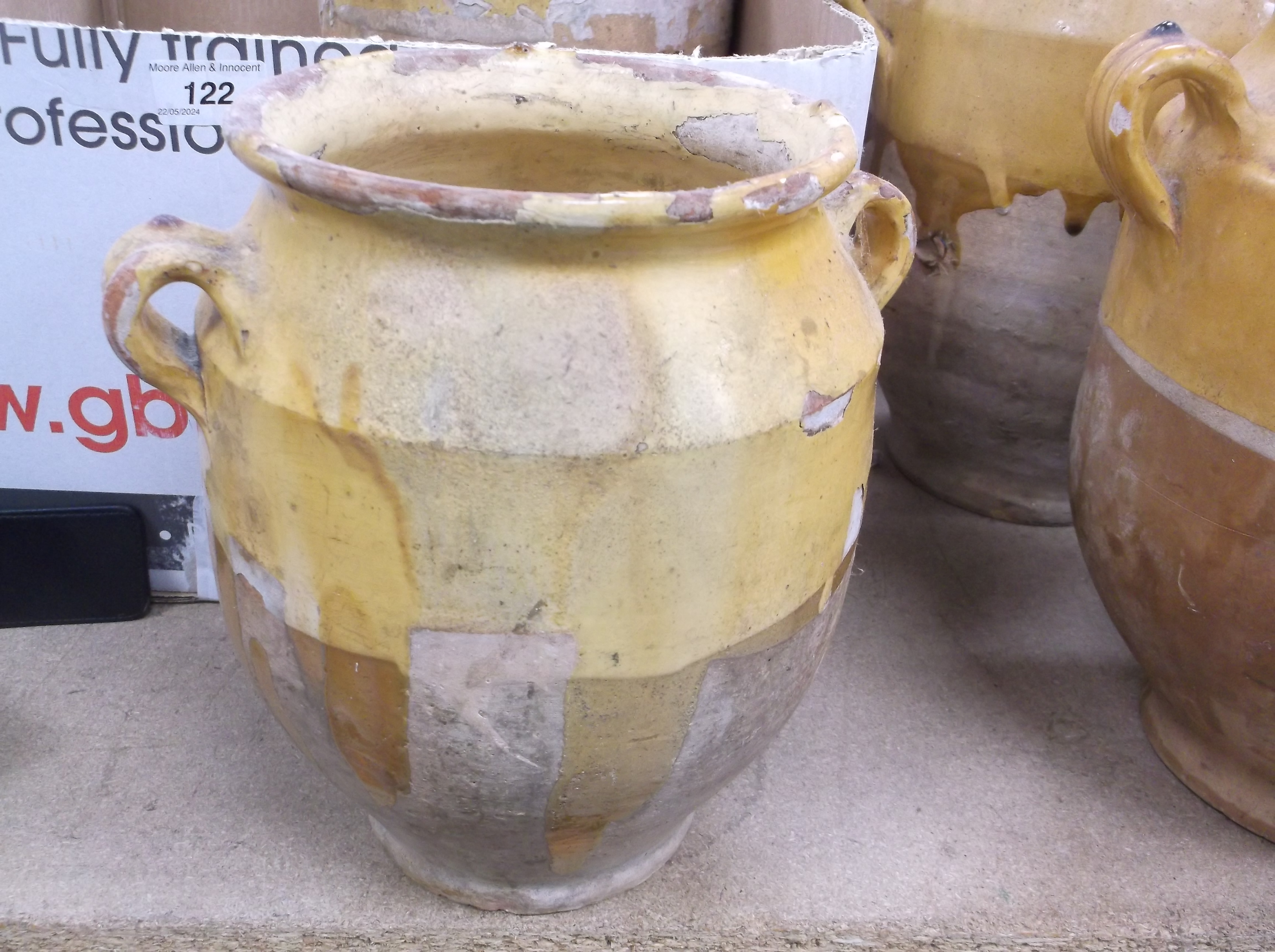 A collection of four 19th Century and later French ochre part glazed confit pots with lug handles, - Image 7 of 21