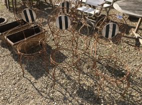 Five wrought iron garden chairs (no seat cushions)