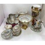 A 19th Century Coalport type fluted and gilt decorated tea set comprising tea pot and stand,