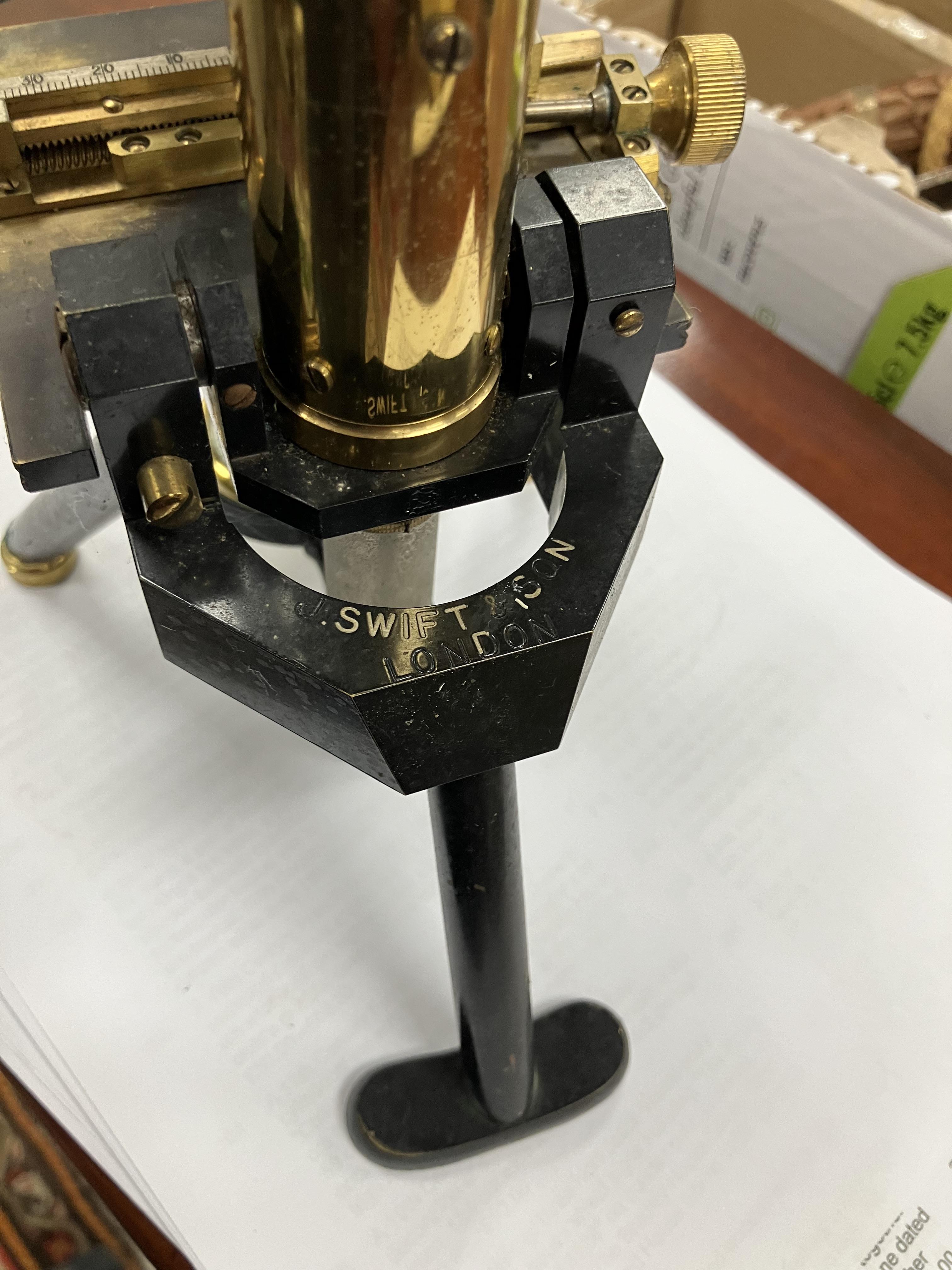 An early 20th Century Swift & Son of London brass and anodised cased monocular microscope and - Image 41 of 61