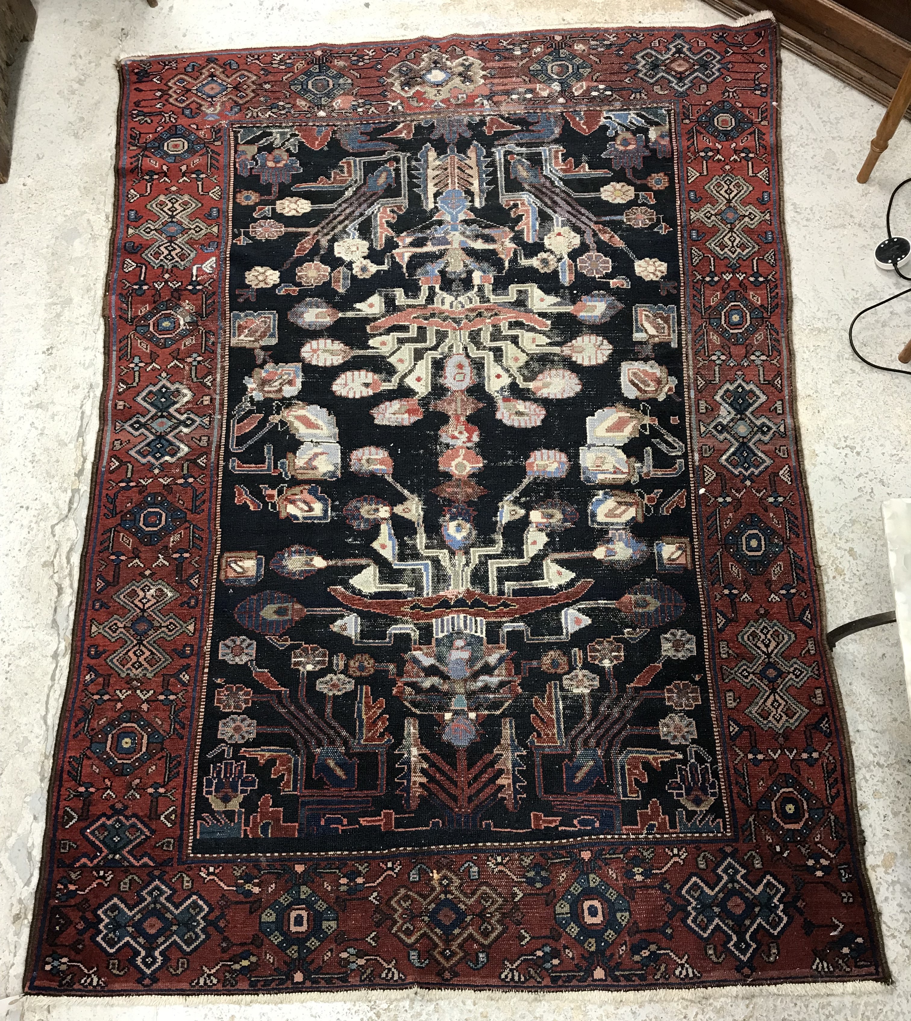 A Caucasian rug, the central panel set with stylised foliate design on a dark blue ground, - Bild 3 aus 6