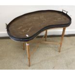 An Edwardian mahogany and marquetry inlaid kidney-shaped drinks' tray with two brass handles,