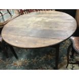 A 19th Century oak dining table,