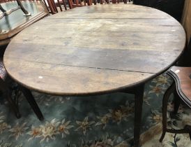 A 19th Century oak dining table,