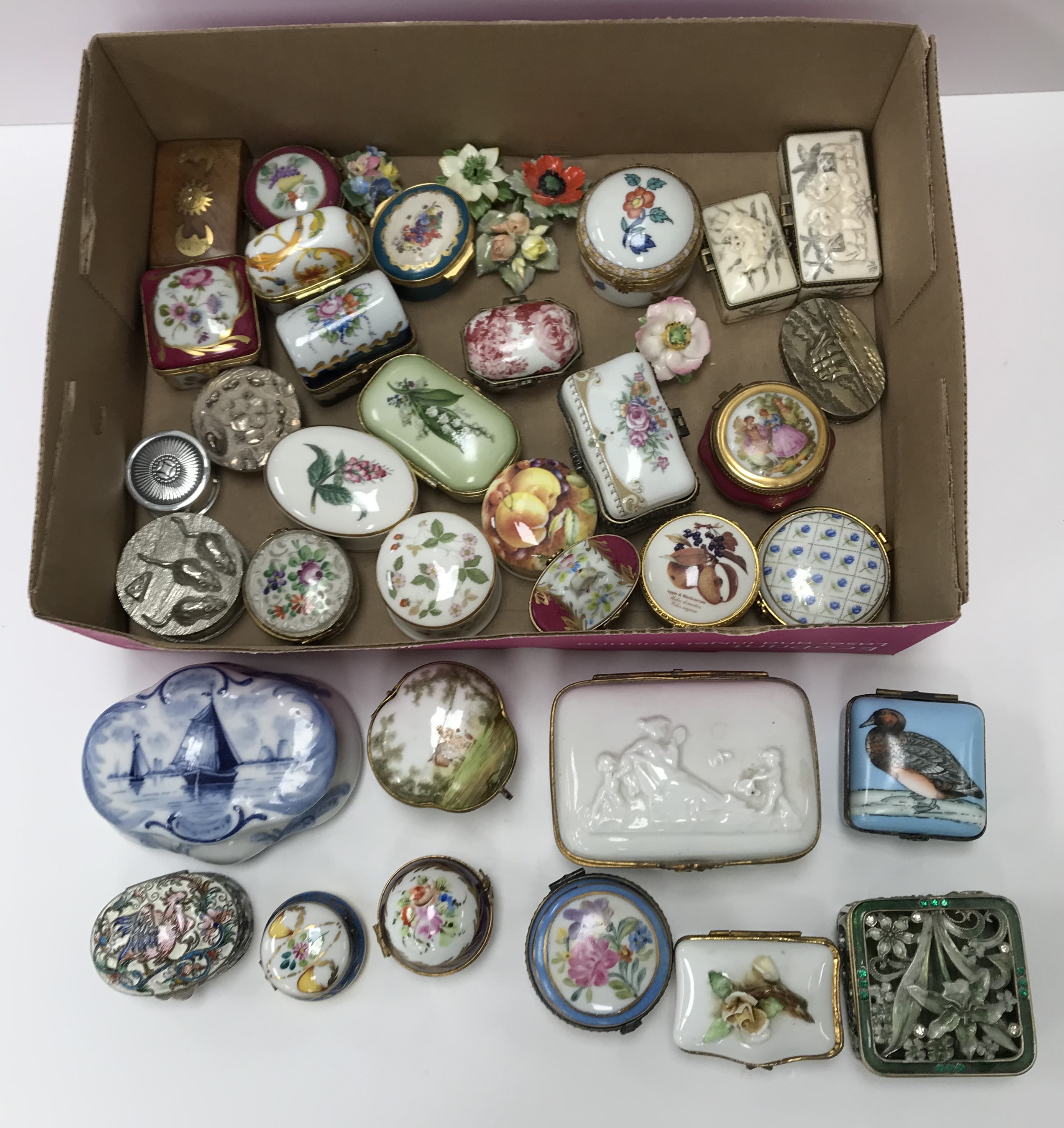 A collection of 34 various miniature, mainly porcelain, boxes,