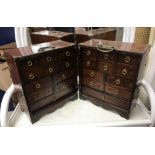 A 20th Century Korean elm and brass mounted table top apothecary chest in two parts,