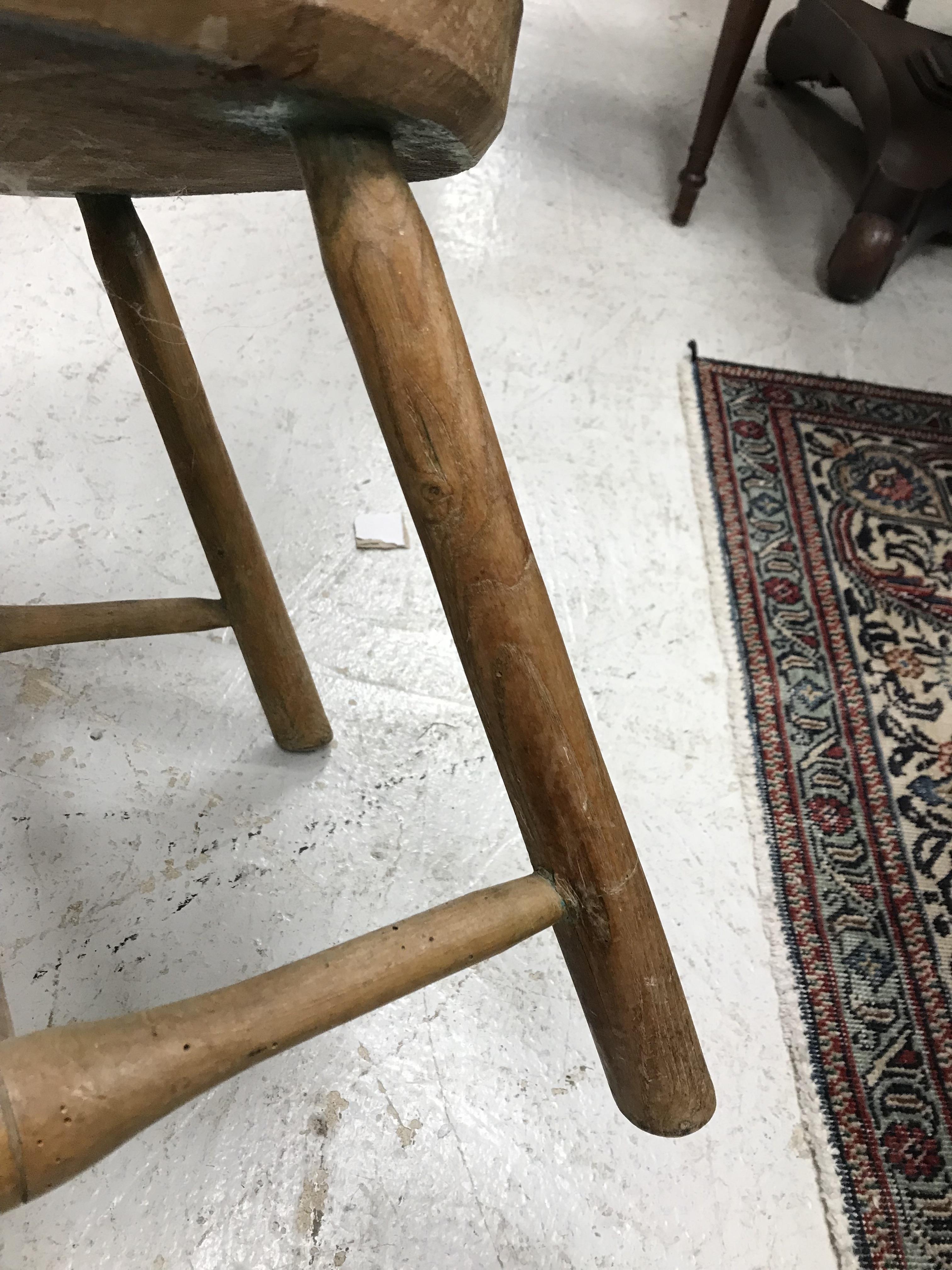 An early 19th Century West Country ash and elm stick back elbow chair, - Image 14 of 39