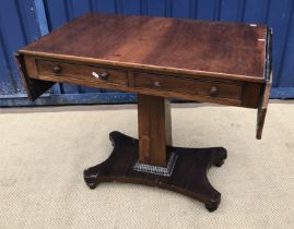 A 19th Century Continental mahogany drop leaf sofa table on a square tapered pedestal to platform