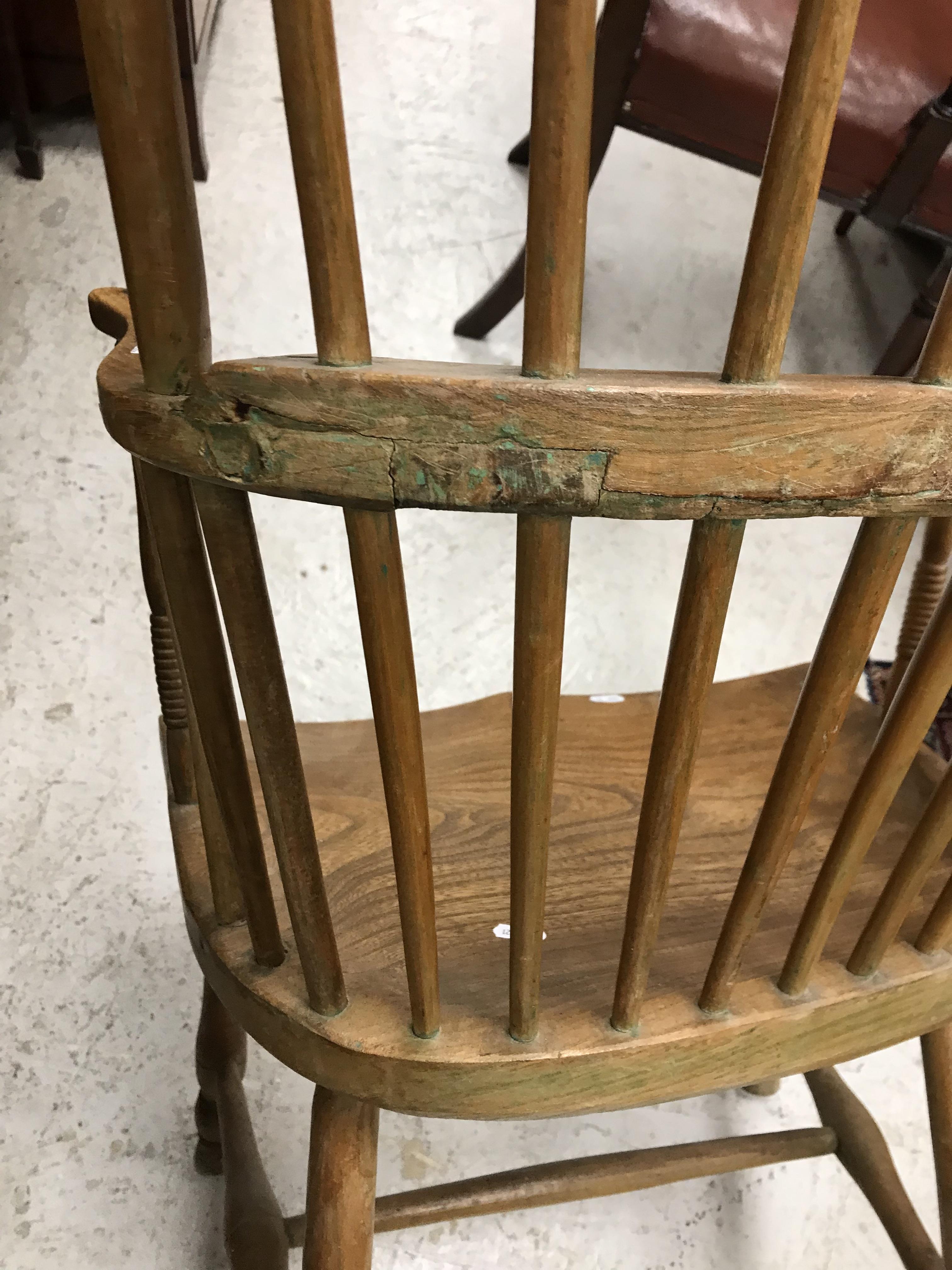 An early 19th Century West Country ash and elm stick back elbow chair, - Image 10 of 39