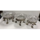 A set of three circa 1900 oval hobnail cut glass sweet meat dishes on electro plated stands in the