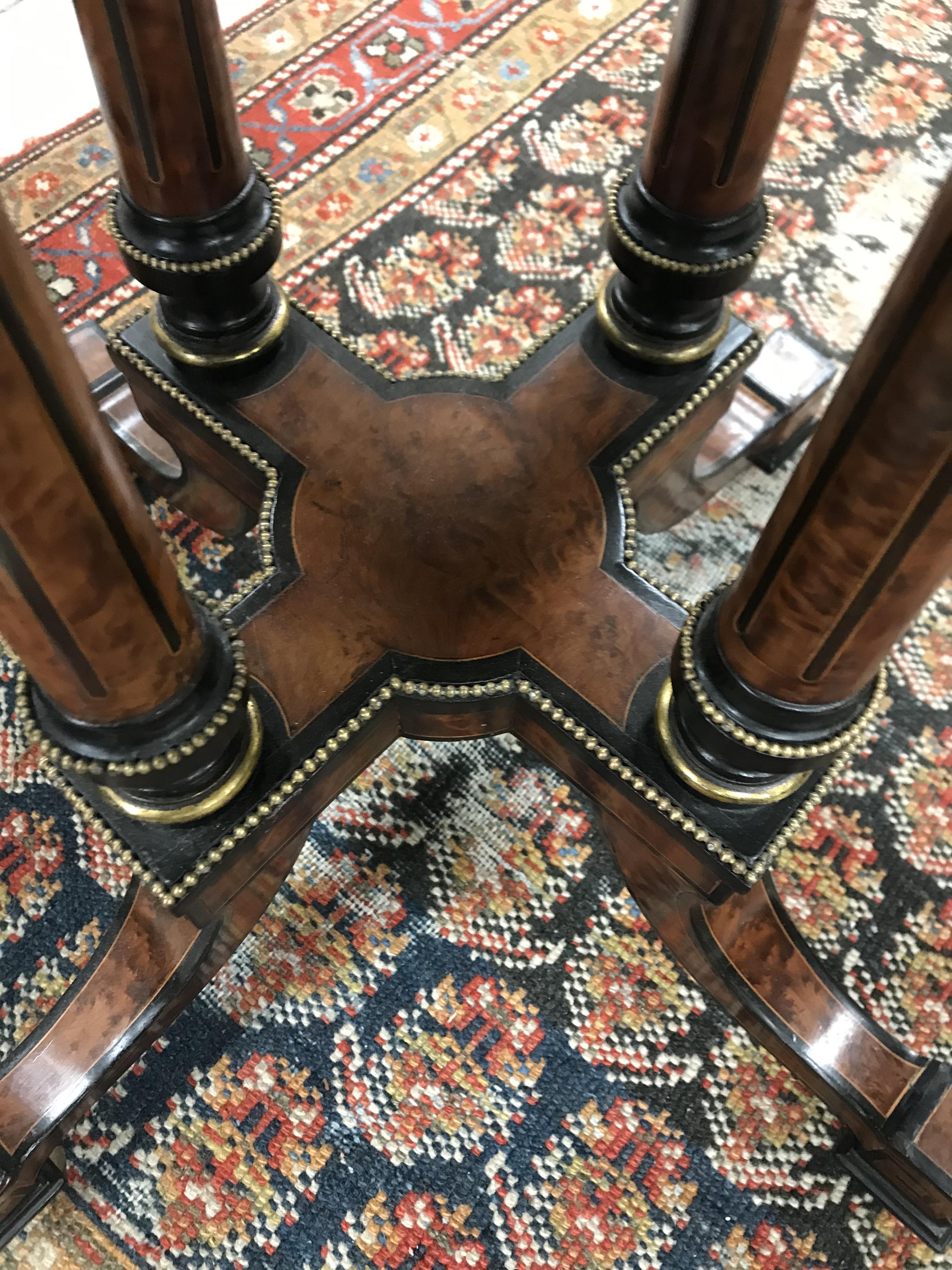 A Victorian amboyna and ebonised centre table, - Image 9 of 34