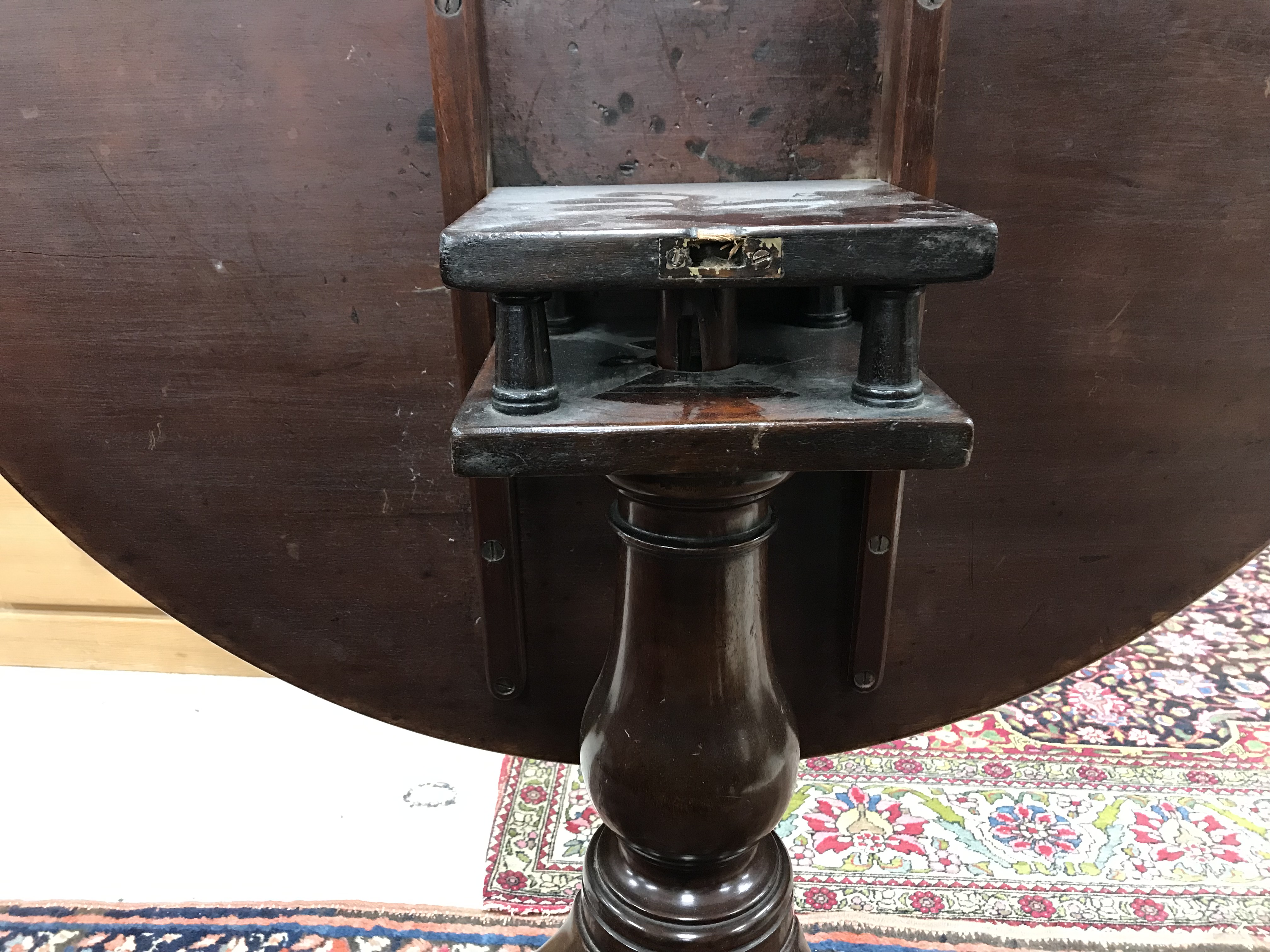 A 19th Century mahogany tea table, the circular snap top with moulded edge tipping on a birdcage, - Image 2 of 2