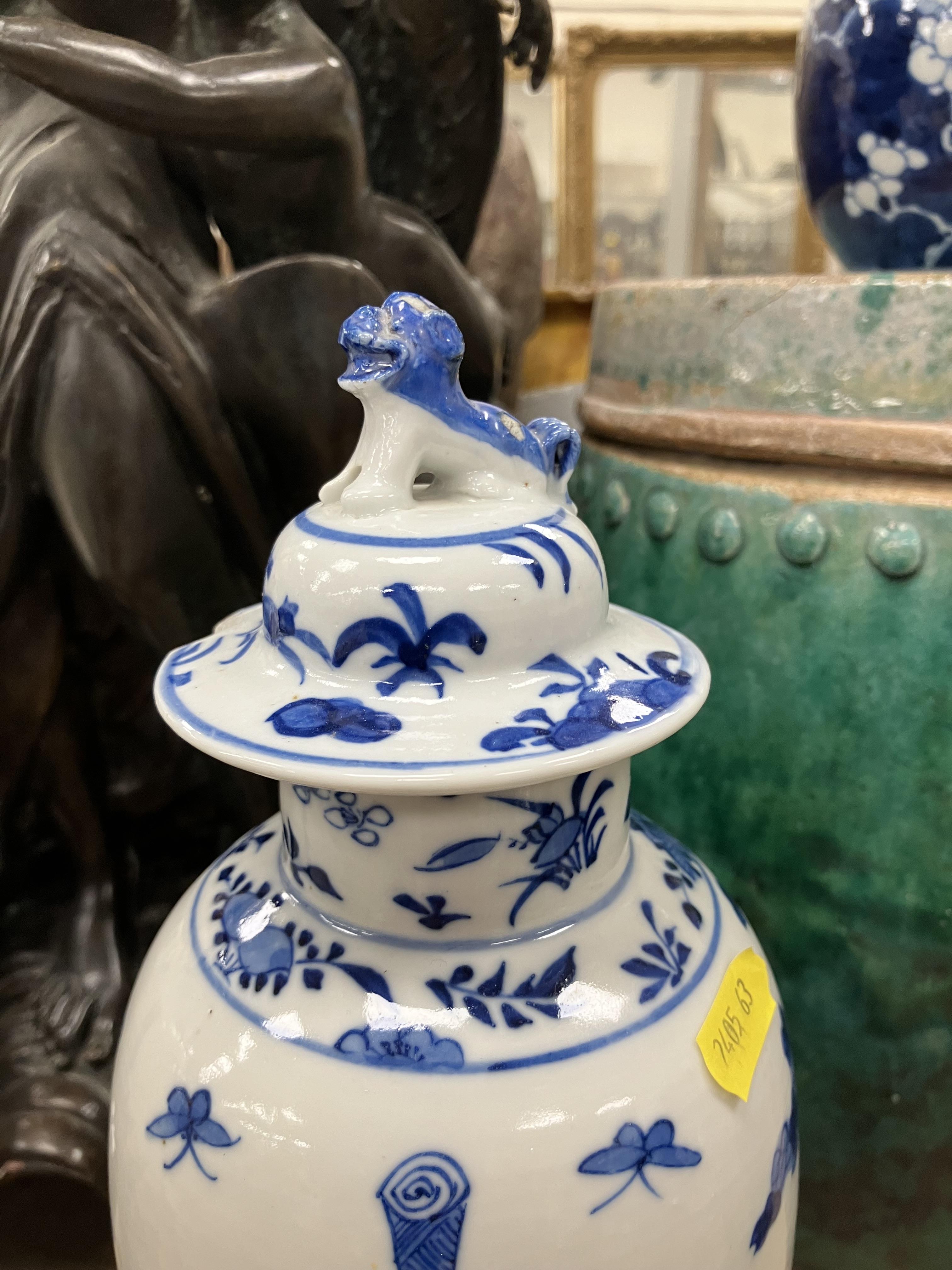 A pair of 19th Century Chinese blue and white baluster shaped vases and covers, - Image 23 of 54