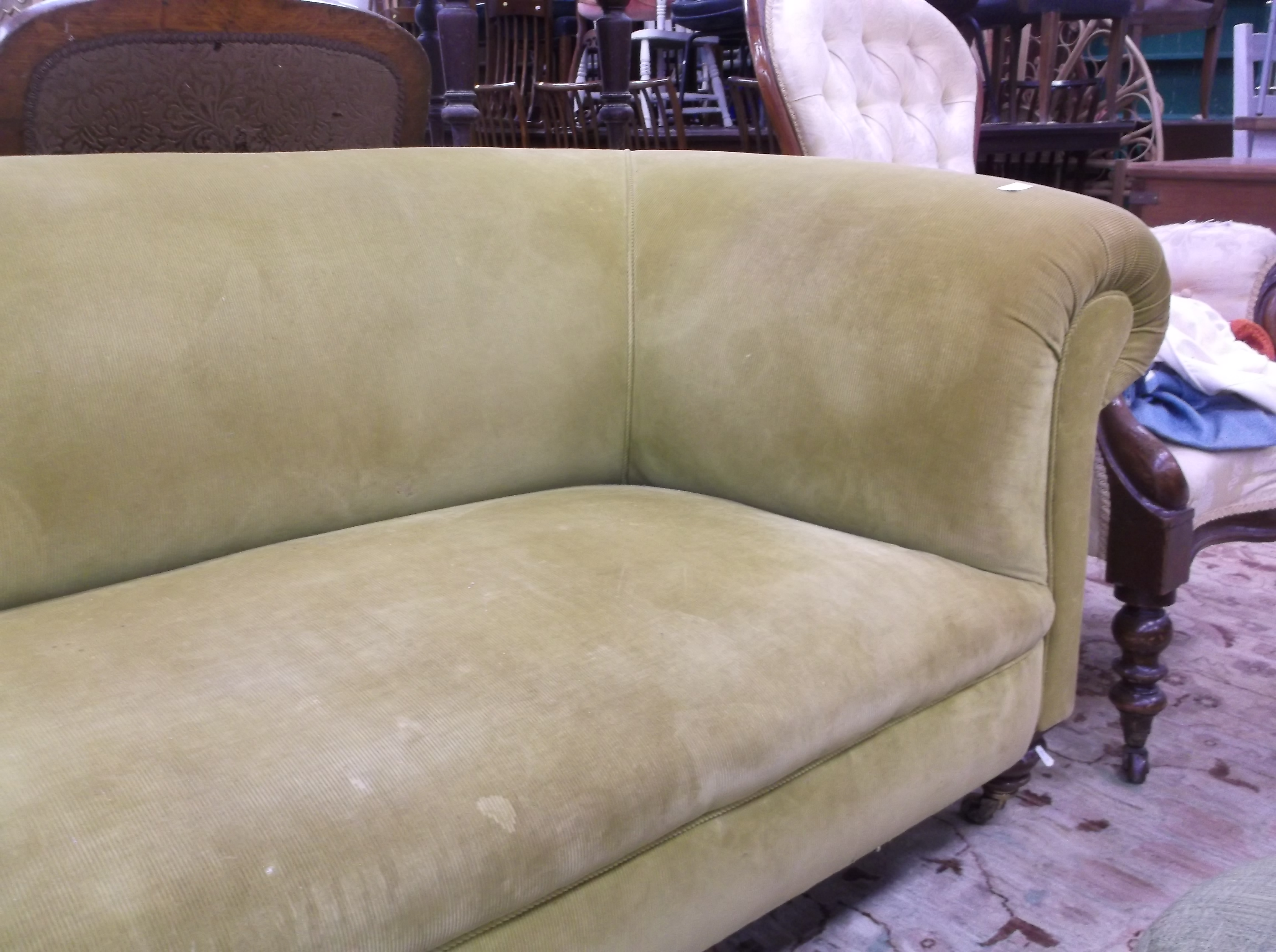 A Victorian Chesterfield sofa in modern lime green corduroy upholstery raised on ringed and turned - Image 3 of 5