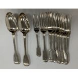 A collection of 19th Century "Fiddle and Thread" pattern cutlery including three table forks (by
