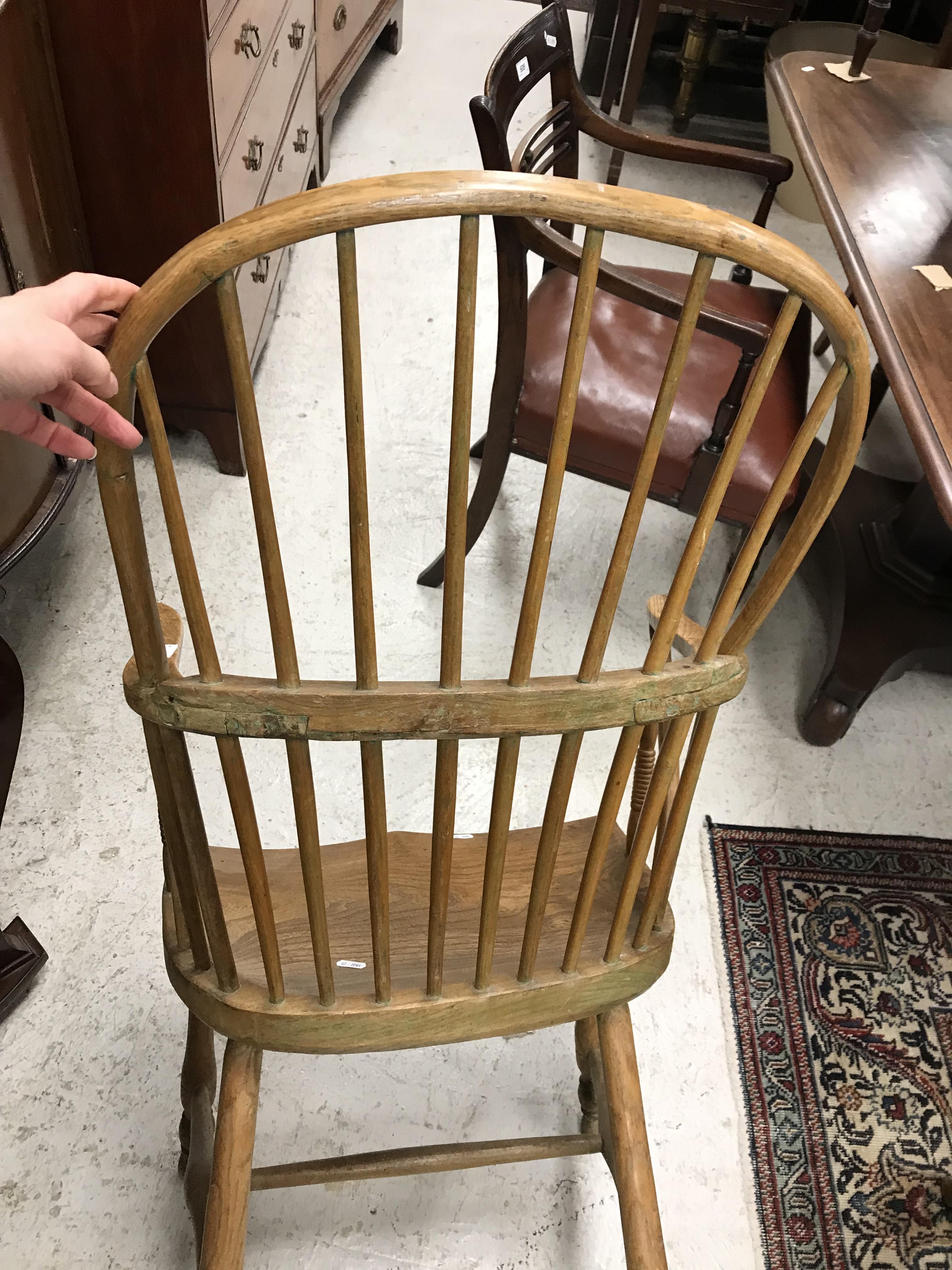 An early 19th Century West Country ash and elm stick back elbow chair, - Image 11 of 39