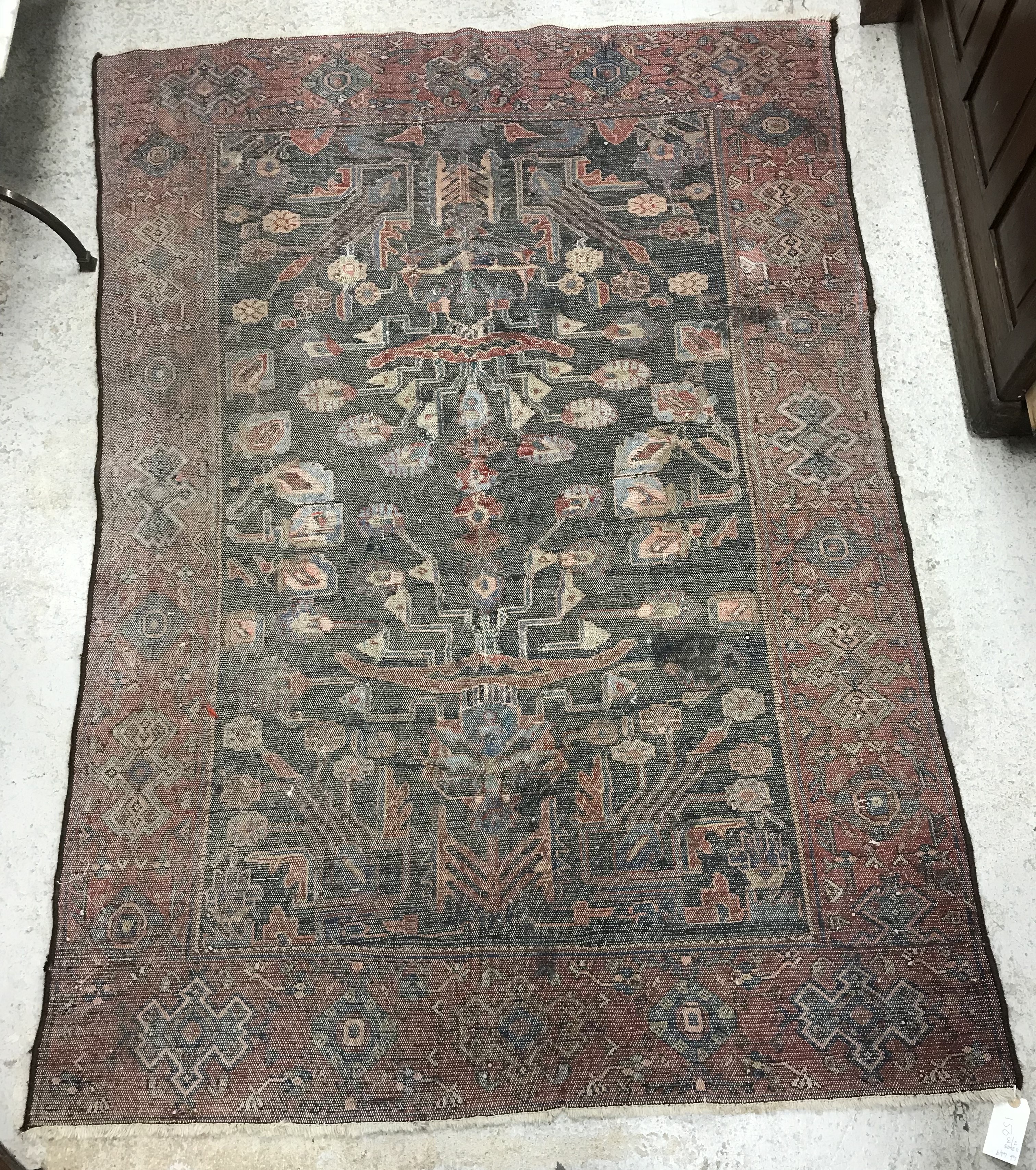 A Caucasian rug, the central panel set with stylised foliate design on a dark blue ground, - Bild 4 aus 6