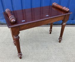 A mahogany window seat in the Victorian manner,