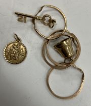 A small quantity of various 9 carat gold jewellery including a Russian type wedding ring in four