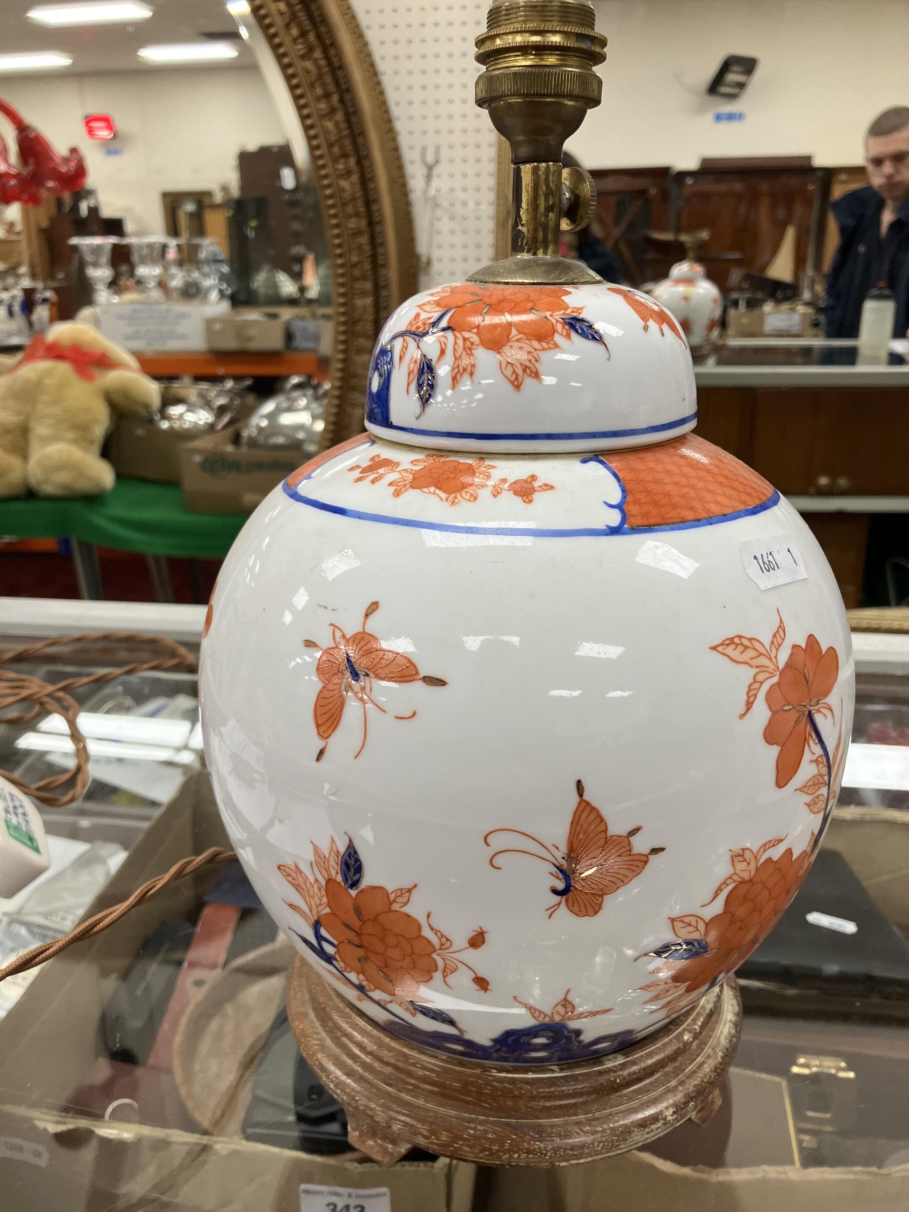 A pair of Japanese porcelain butterfly and flower decorated table lamps of ginger jar form in the - Image 8 of 32