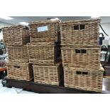 A collection of nine wicker picnic hampers
