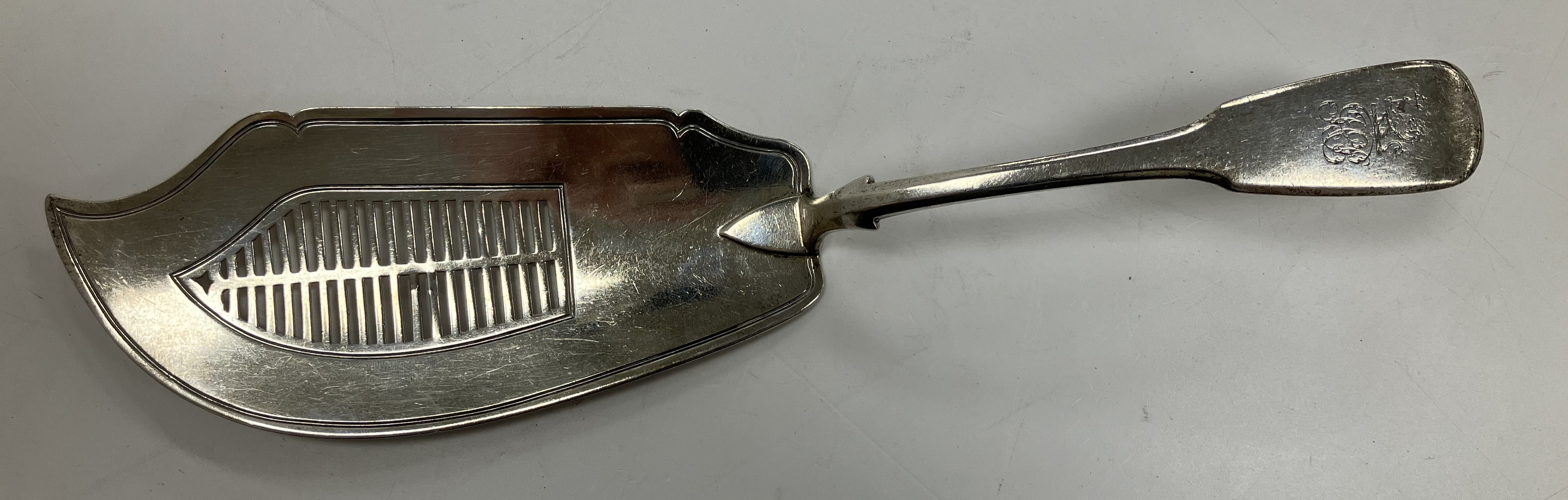 A George III silver "Fiddle" pattern fish server with pierced blade (by Edward Farrell,