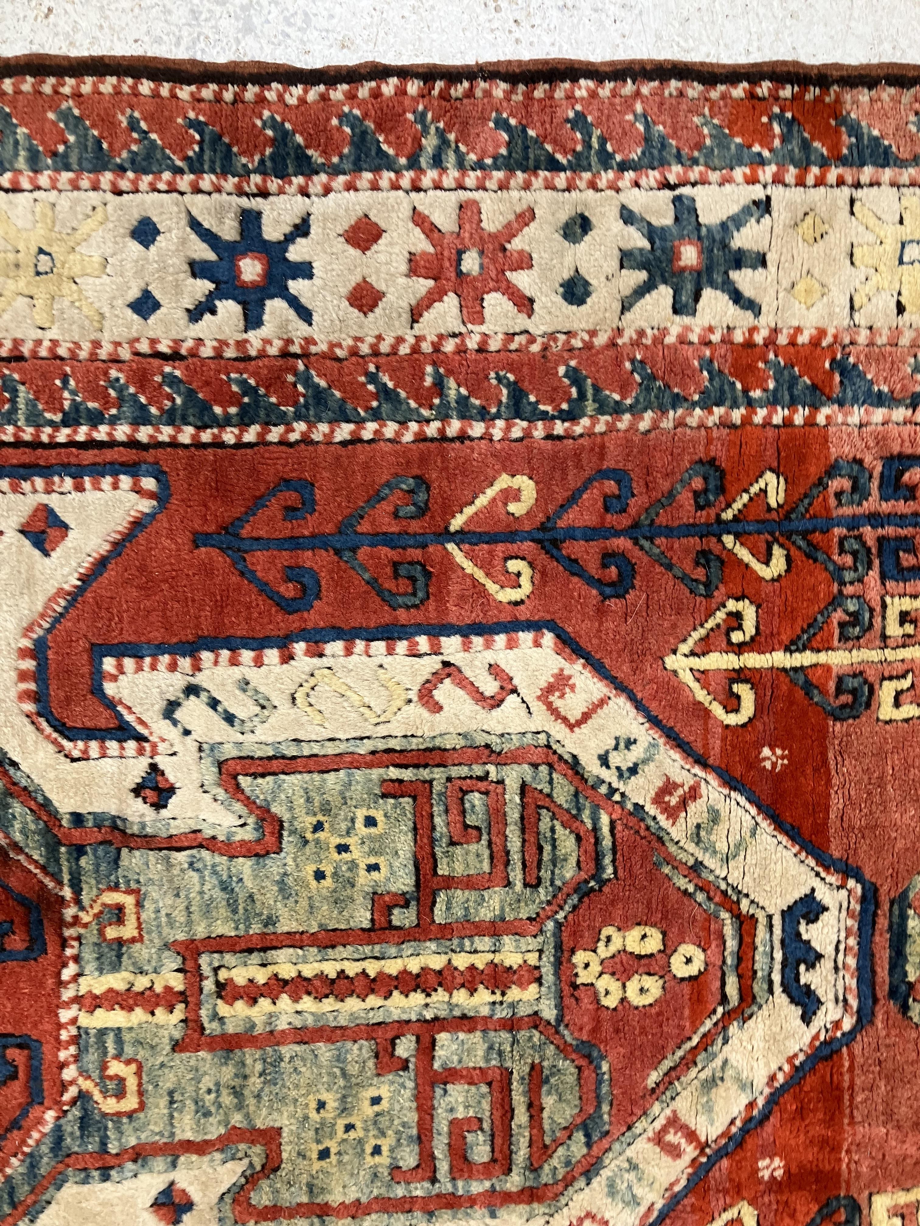 A fine Turkish carpet, - Image 5 of 16