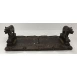 A circa 1900 Black Forest treen ware "Bear" adjustable book slide, 33.5 cm wide (closed) x 13.